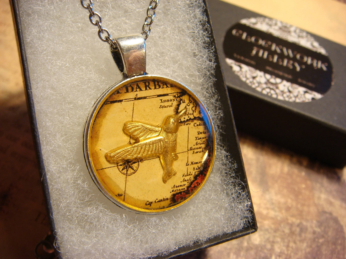 Hummingbird over Map Pendant Necklace