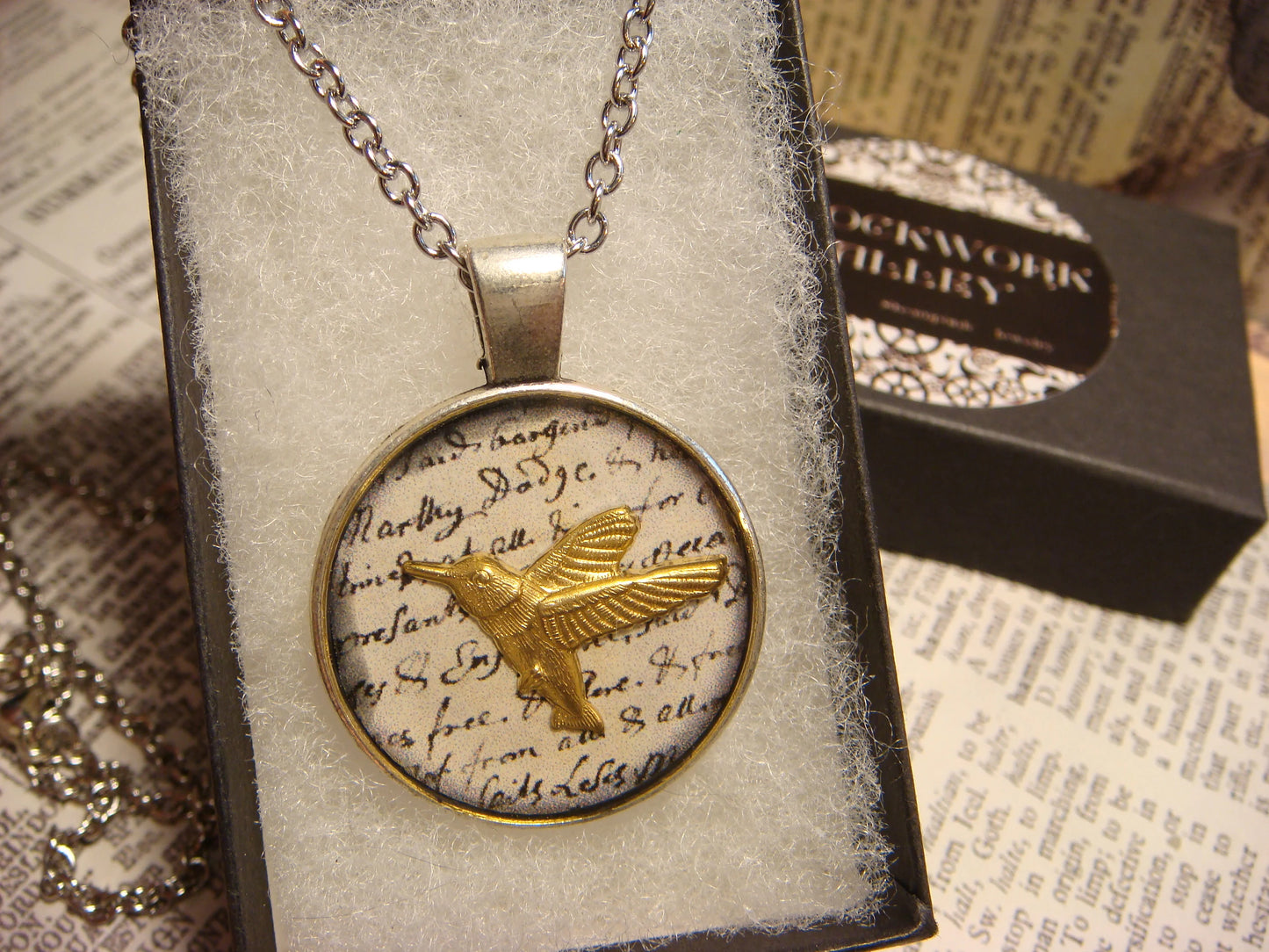Hummingbird over Writing Pendant Necklace