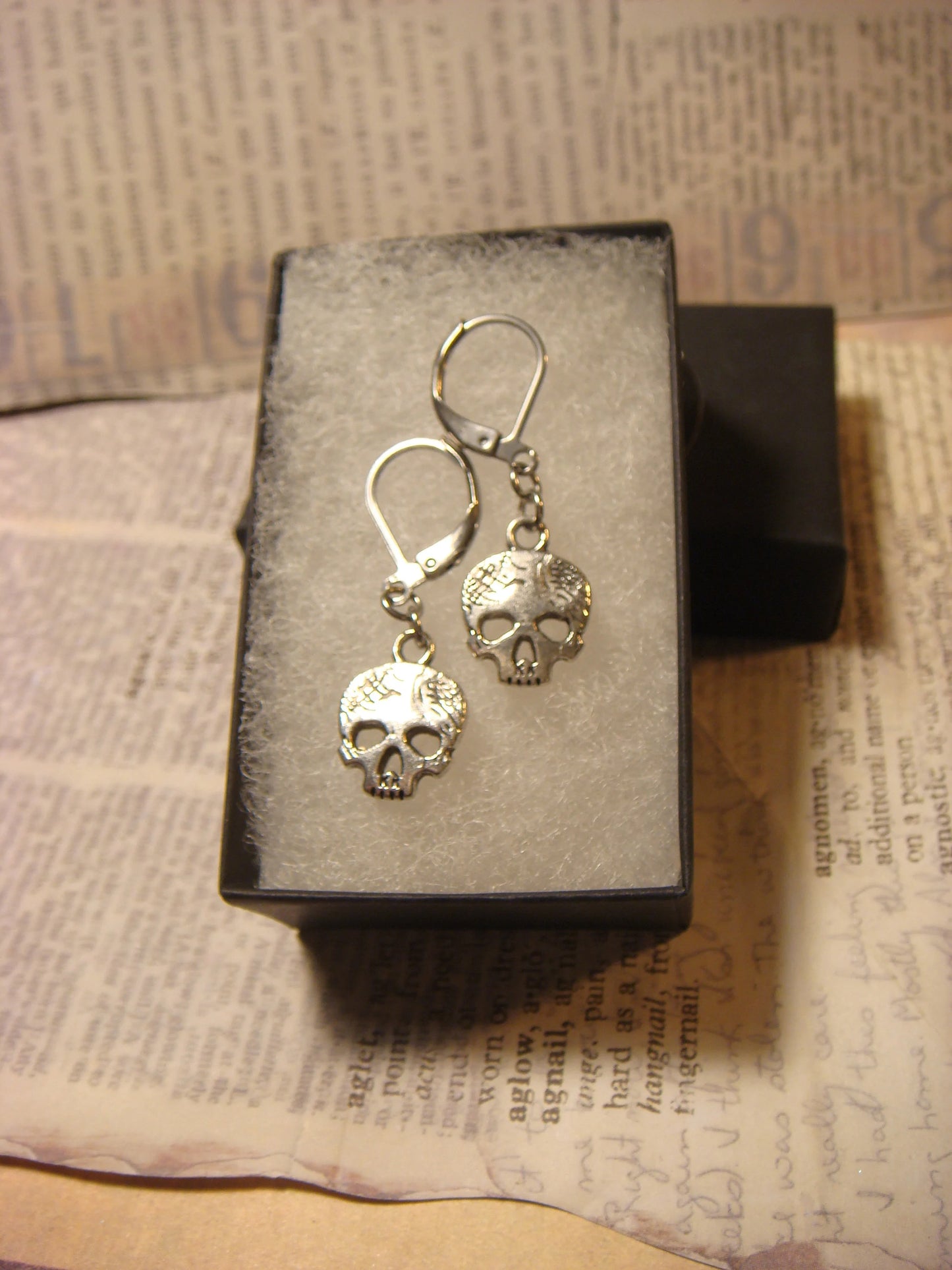 Skull Dangle Earrings in Antique Silver