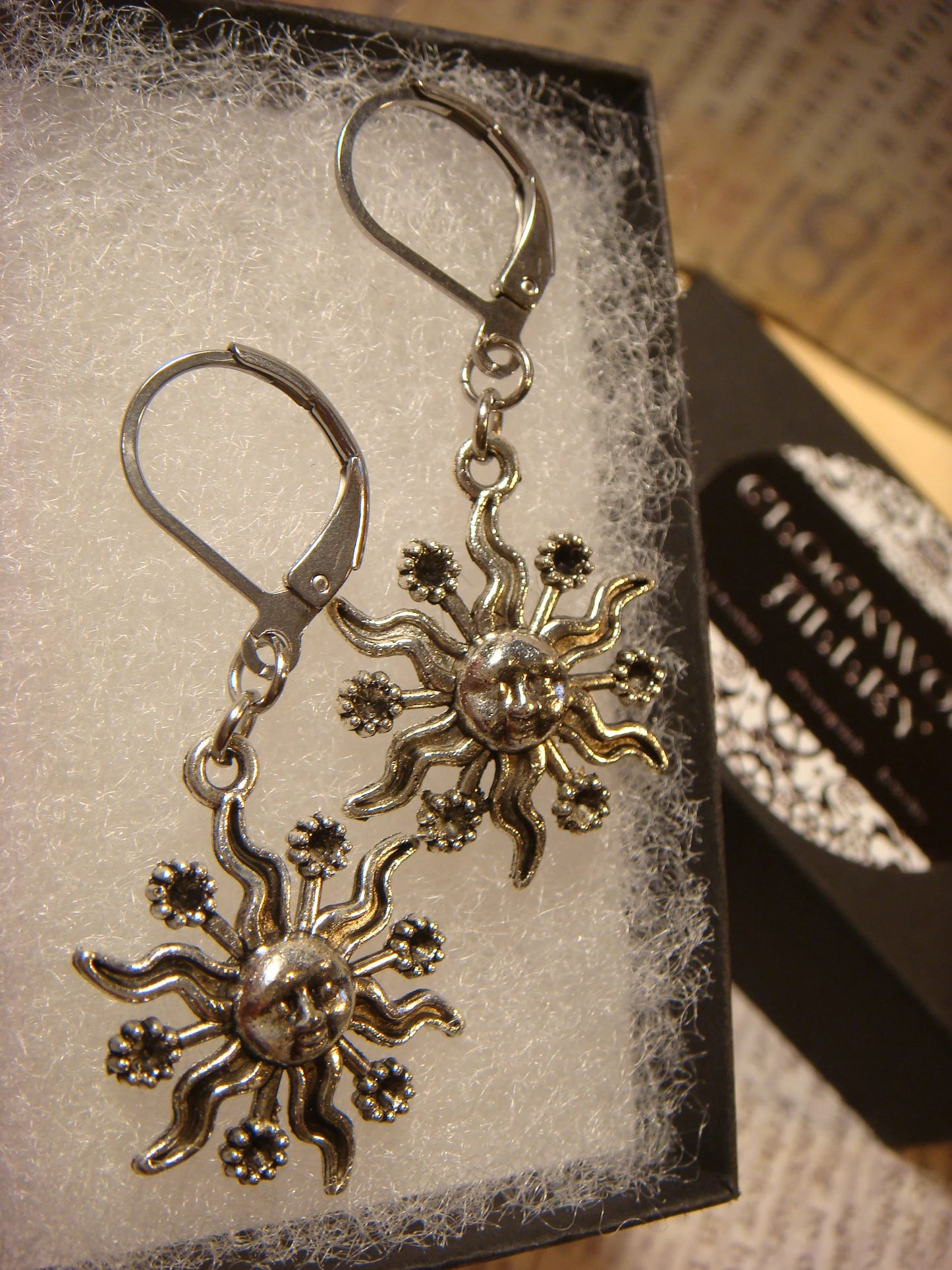 Sun Face Dangle Earrings in Antique Silver