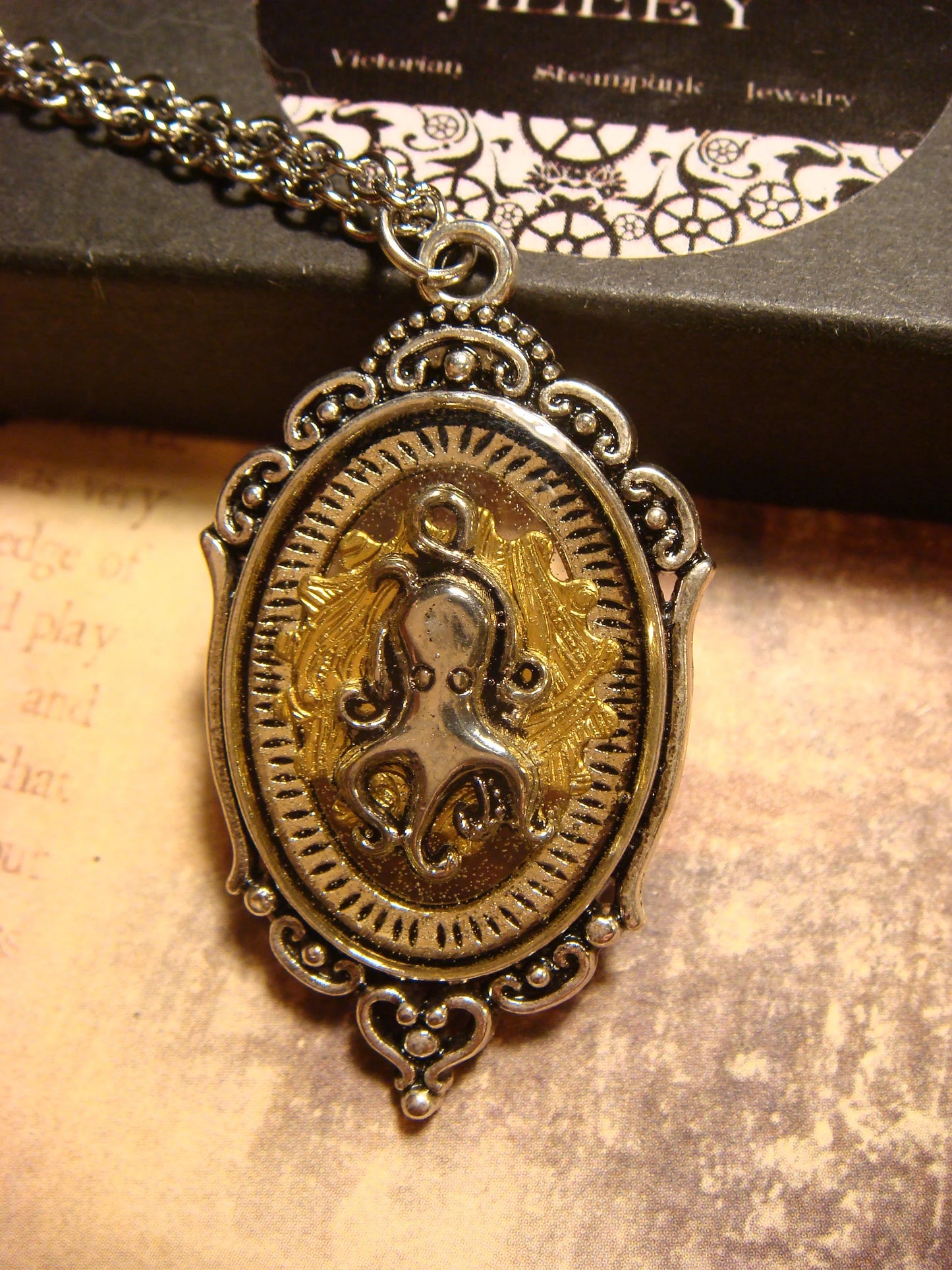 Octopus over Etched Gear in See-thru Ornate Necklace