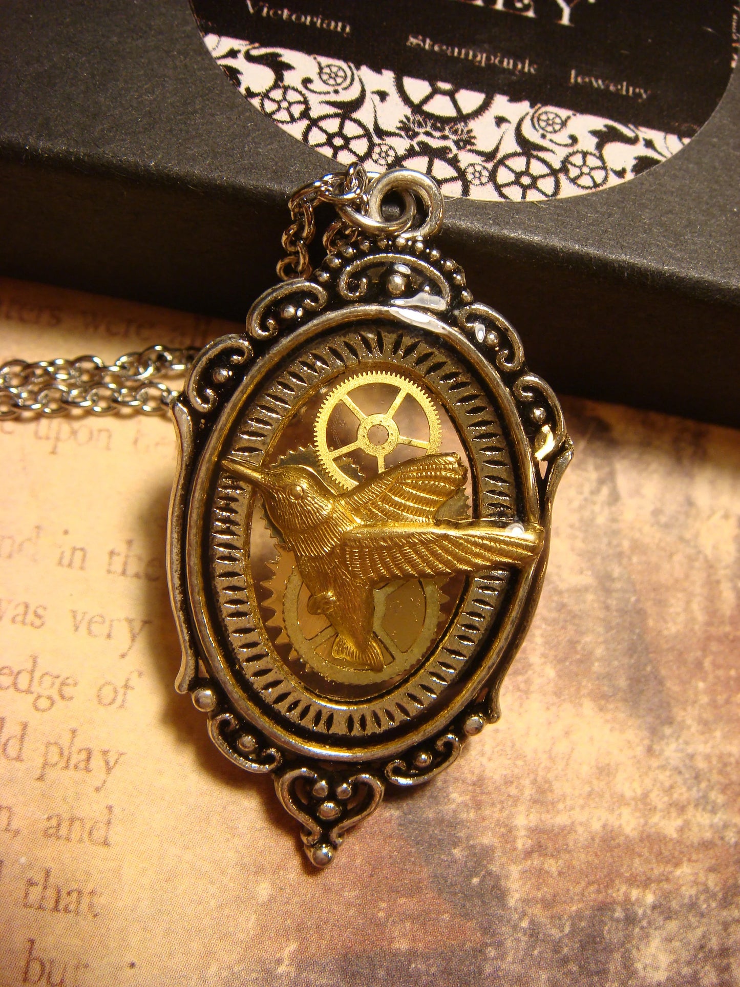 Hummingbird with Gears in See-thru Ornate Necklace