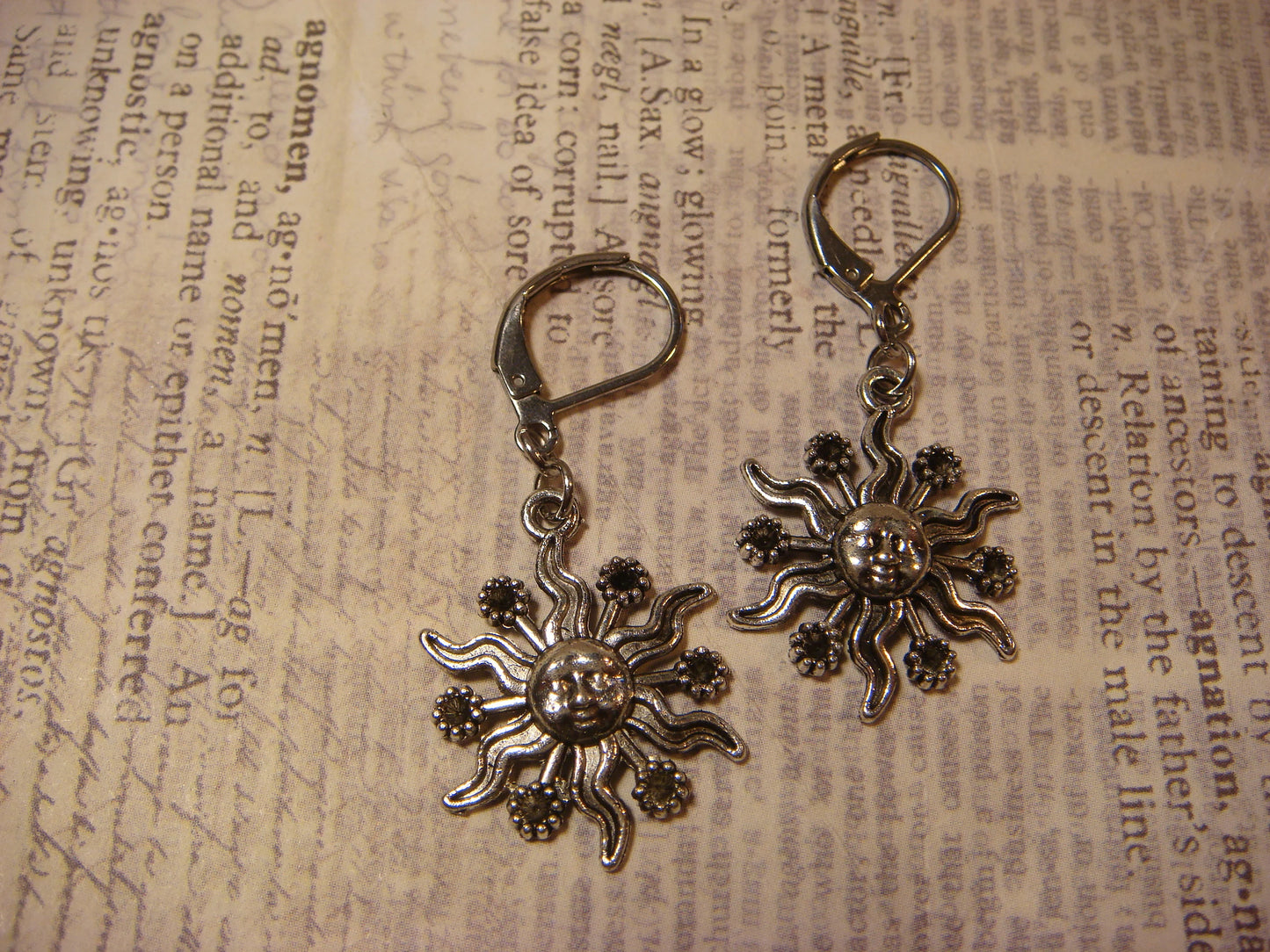 Sun Face Dangle Earrings in Antique Silver