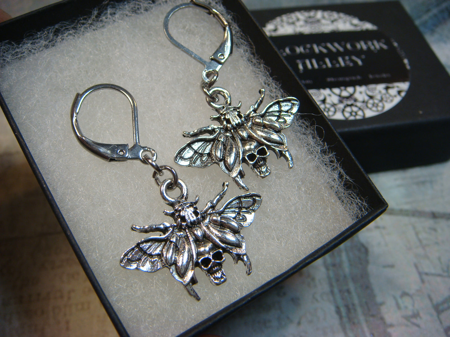 Moth Skull Dangle Earrings in Antique Silver