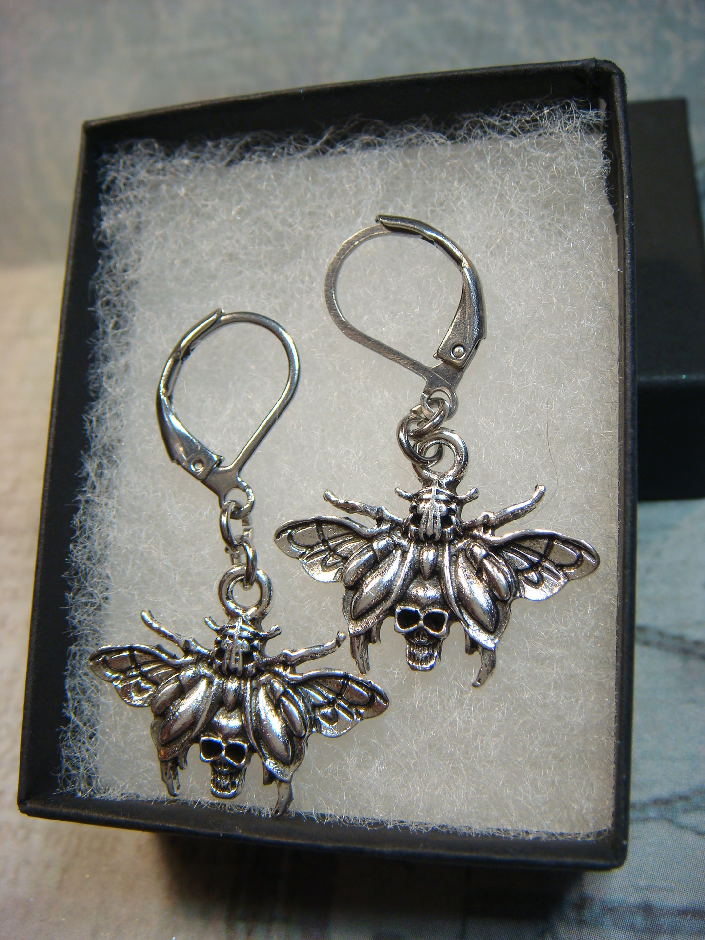 Moth Skull Dangle Earrings in Antique Silver