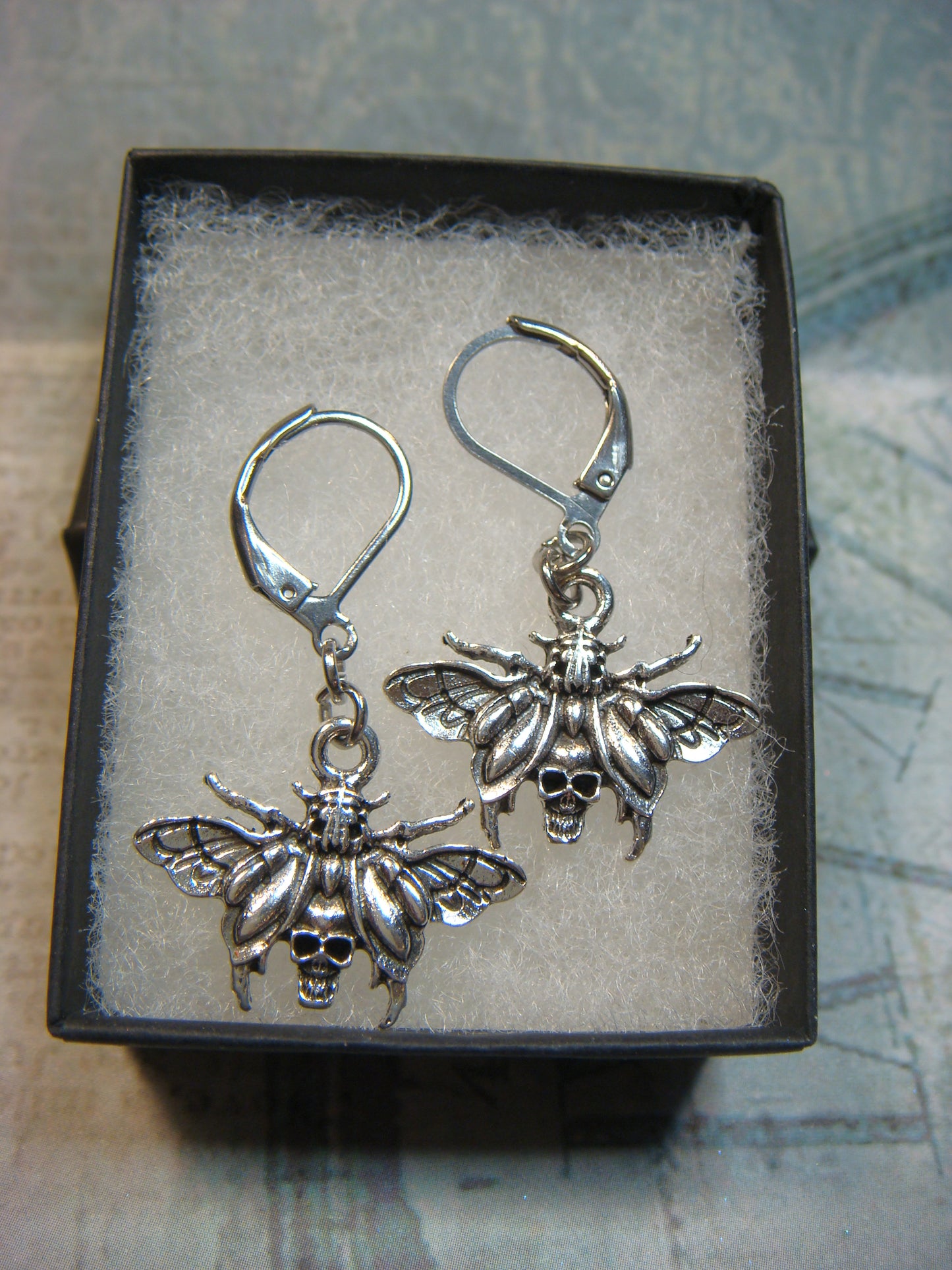 Moth Skull Dangle Earrings in Antique Silver