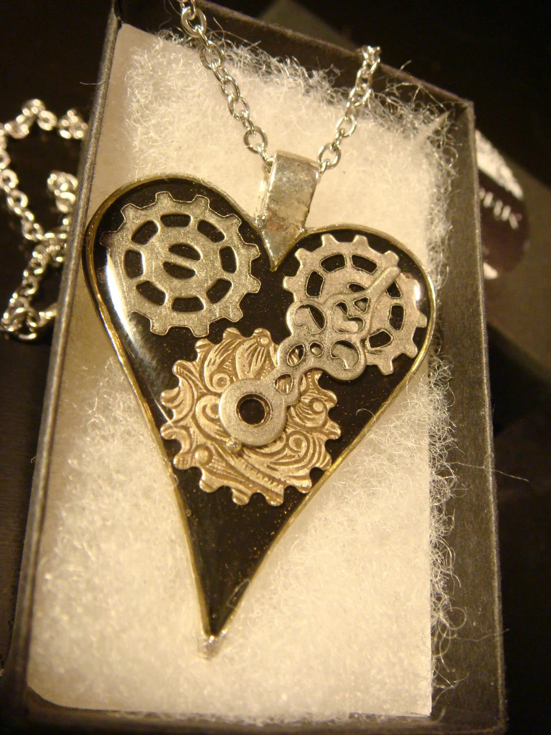 Black Heart with Gears and Hands Necklace