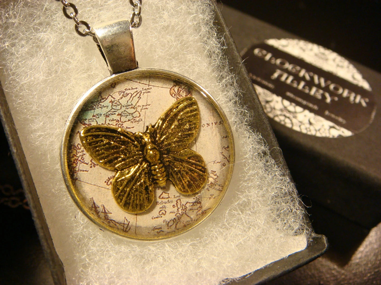 Butterfly over Map Pendant Necklace