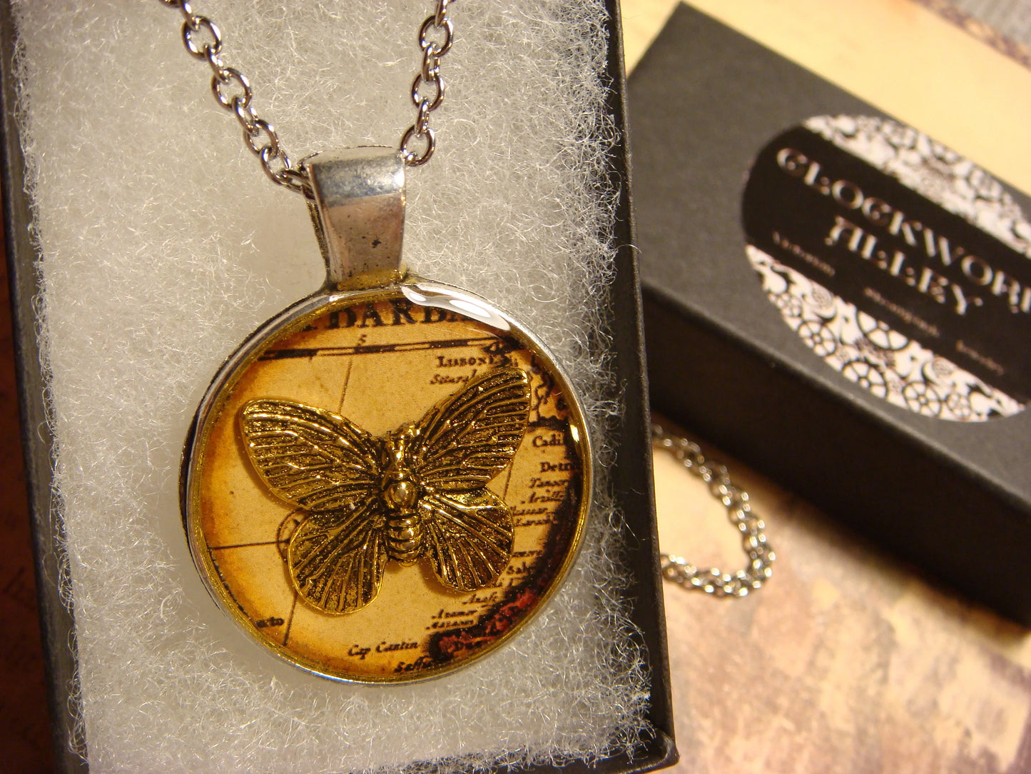 Butterfly over Map Pendant Necklace