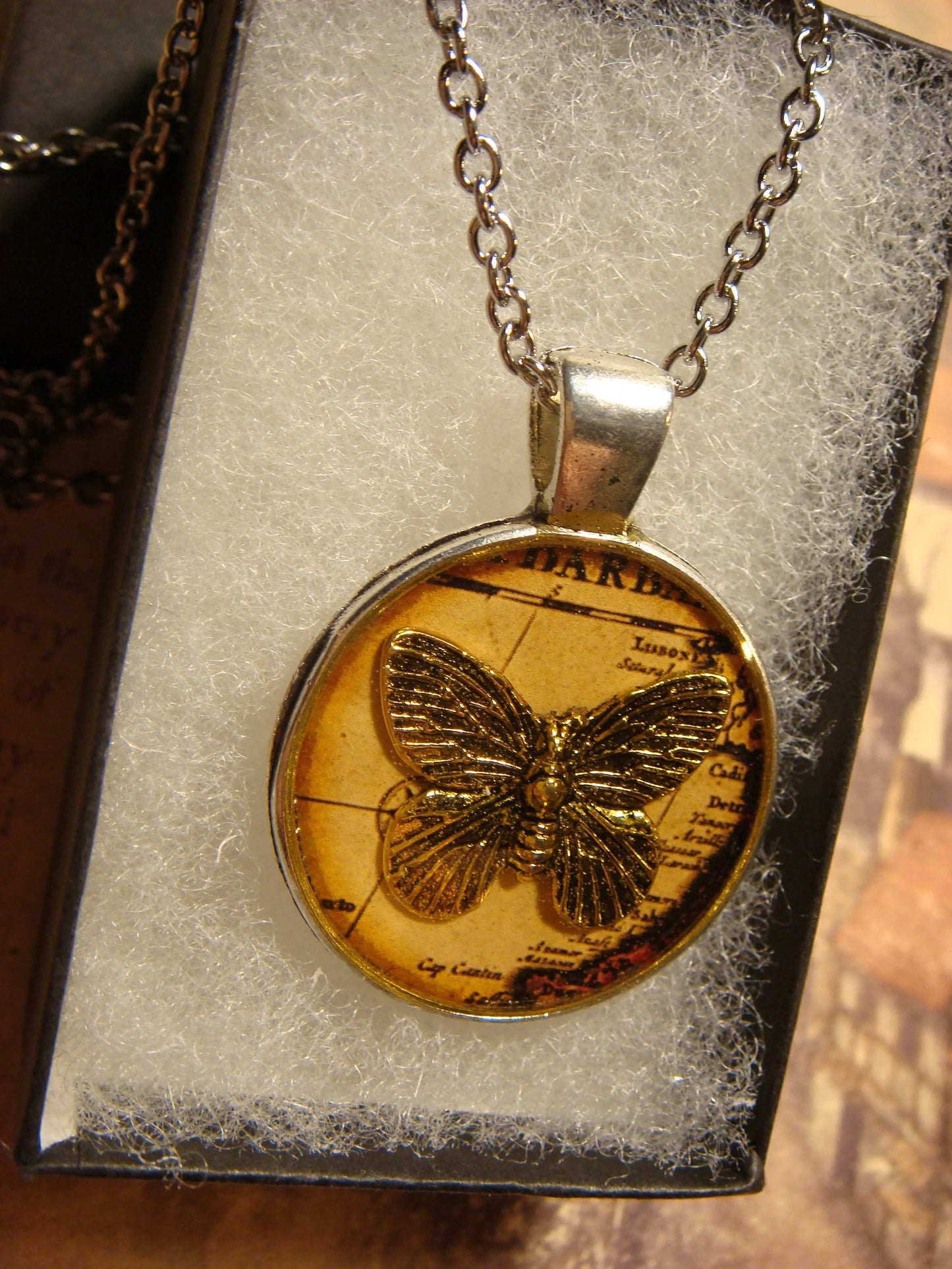 Butterfly over Map Pendant Necklace