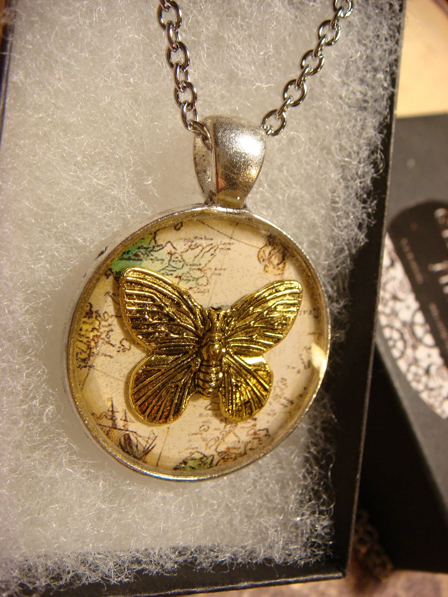 Butterfly over Map Pendant Necklace