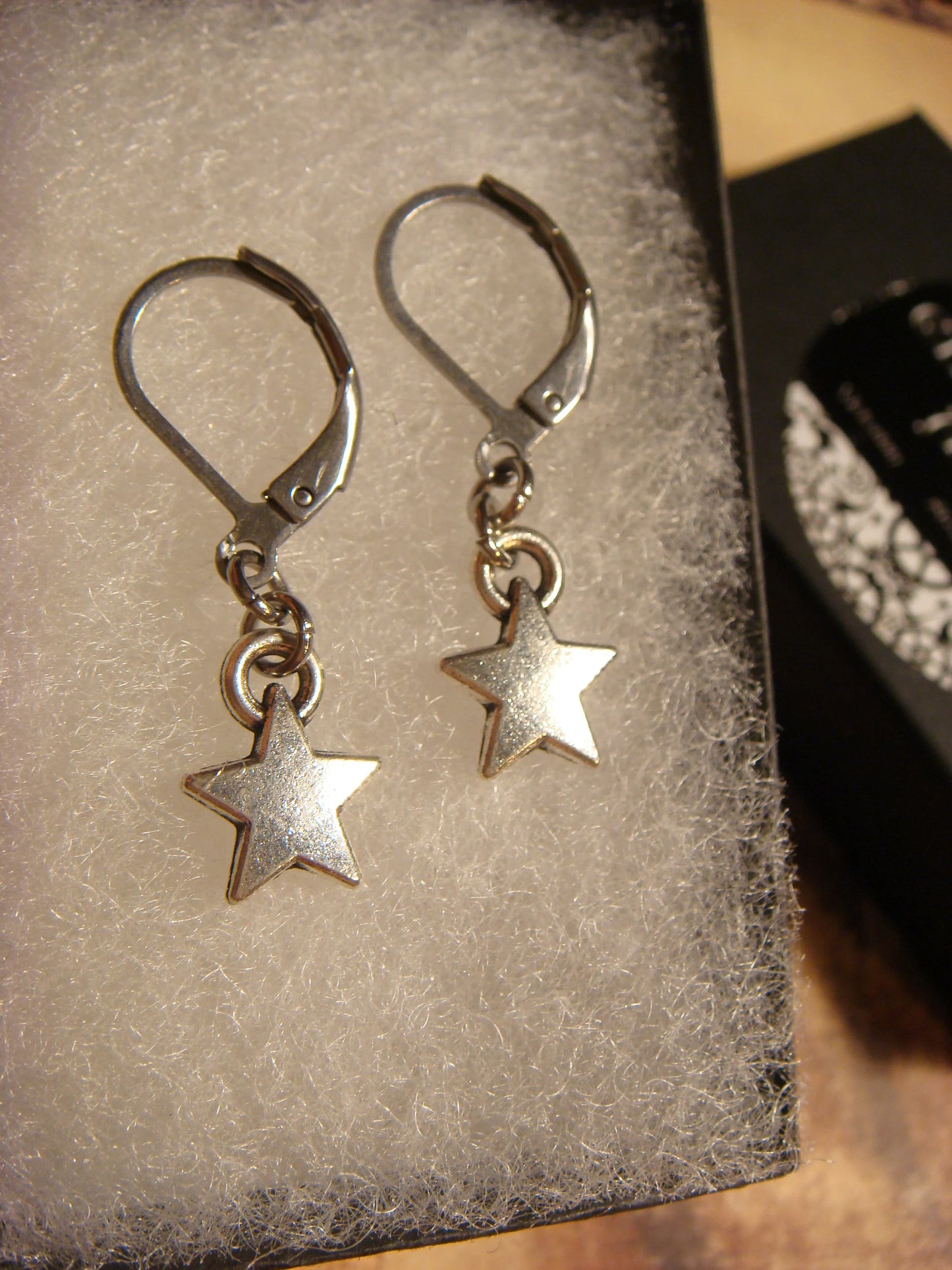 Star Dangle Earrings in Antique Silver