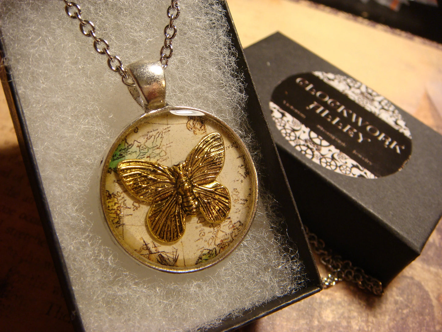 Butterfly over Map Pendant Necklace