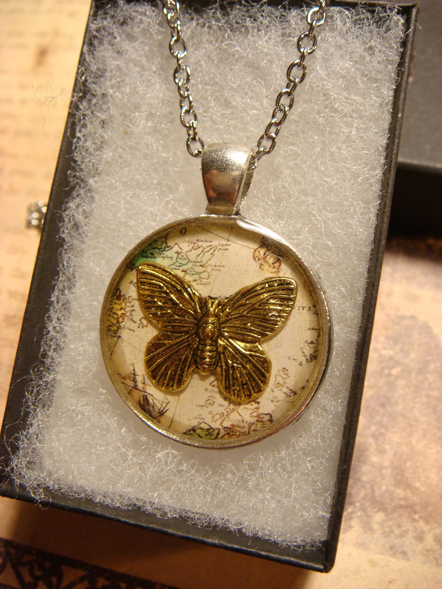 Butterfly over Map Pendant Necklace