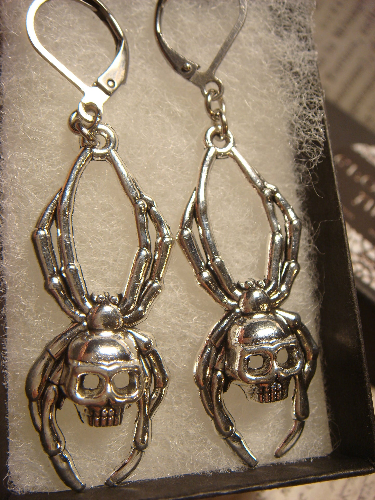 Spider Skull Dangle Earrings in Antique Silver