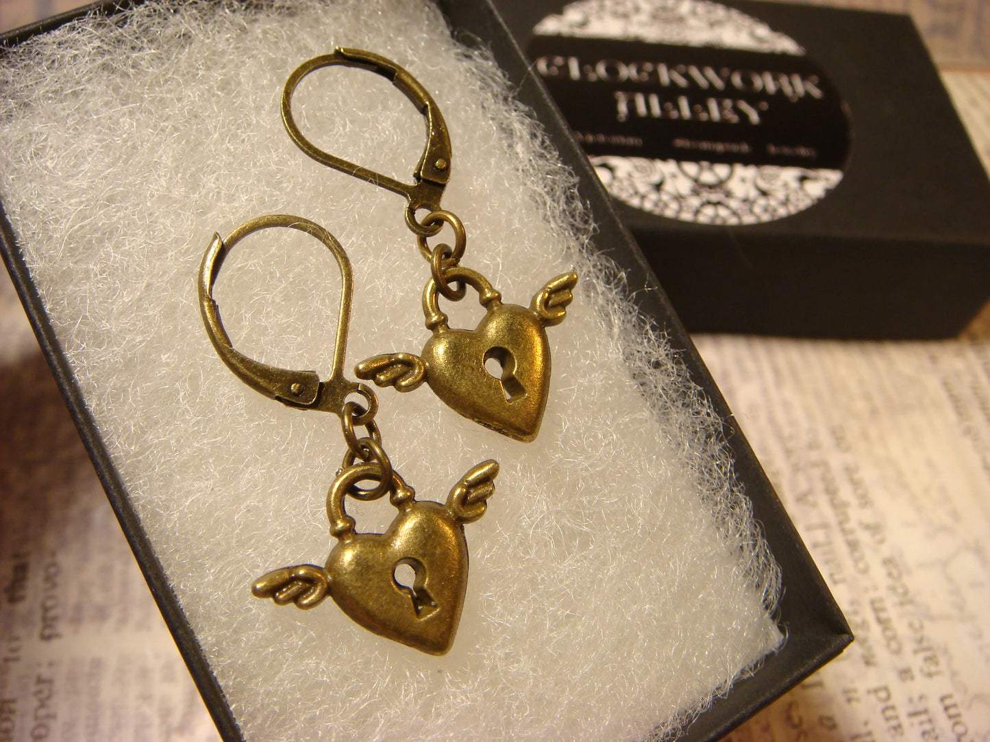 Winged Heart Lock Dangle Earrings in Antique Bronze